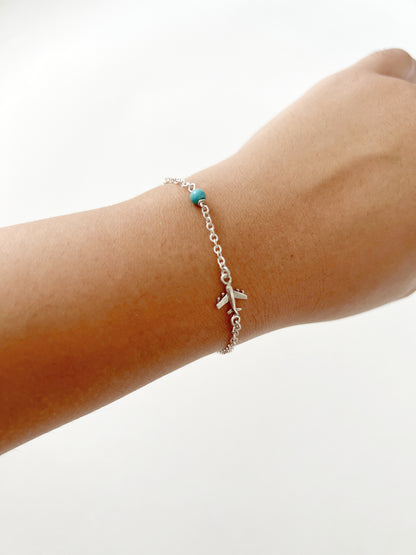 Pulsera avión con piedra azul